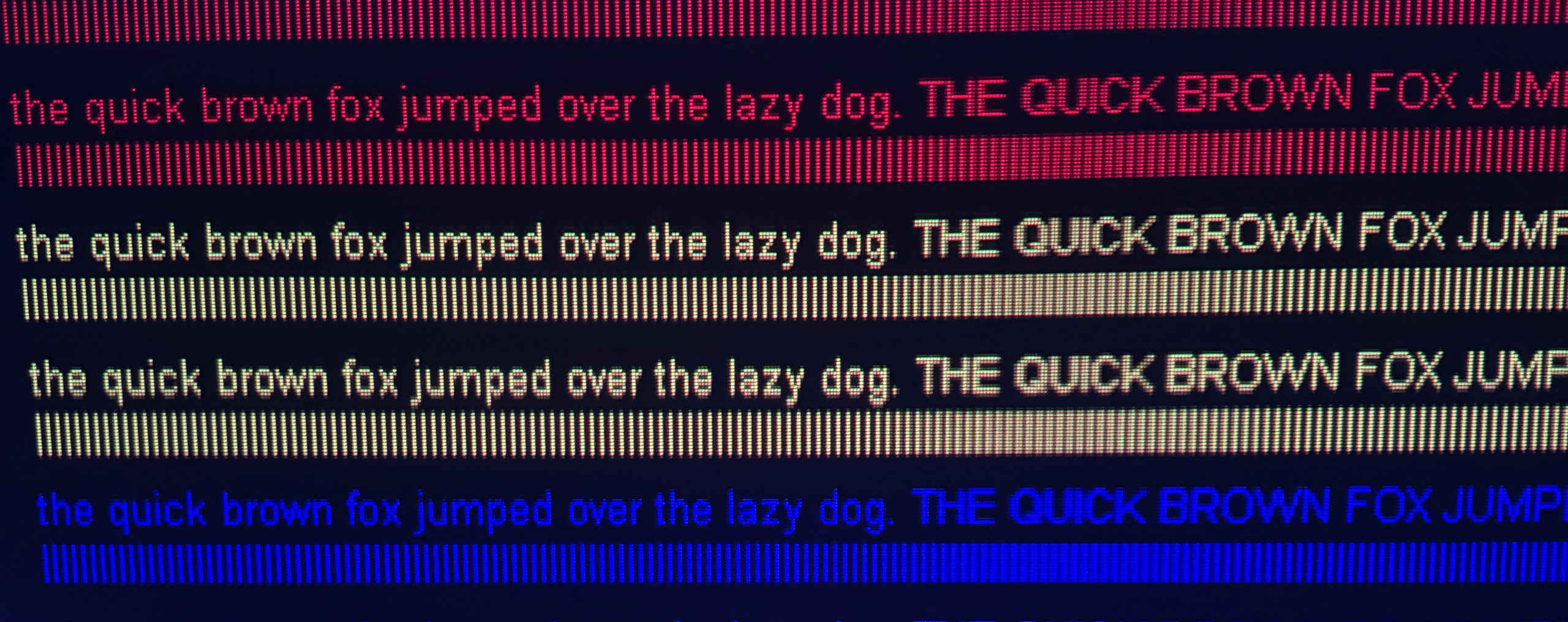 Close-up of the QBF pattern at 1080p: lines of text with line gratings beneath them; on the right, the gratings lose separation and merge into a solid band
